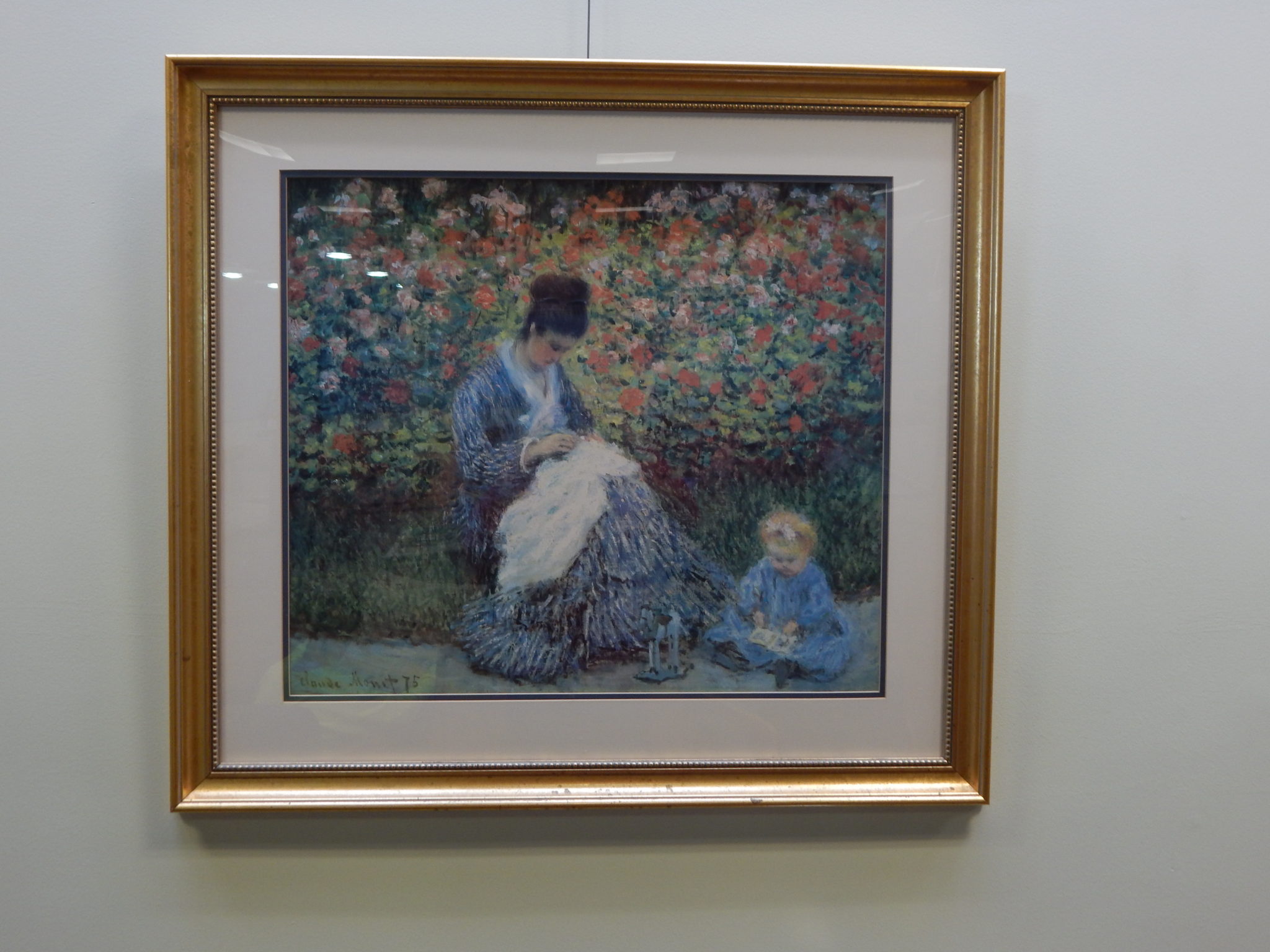 Camille Monet and a Child in the Artist's Garden in Argenteuil, 1875, by Claude Monet, print